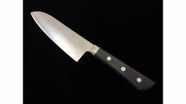 A kitchen knife photographed on an ultra-black background